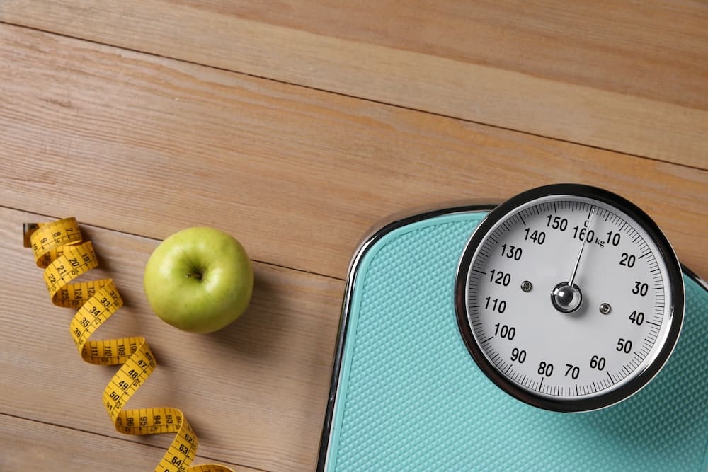 weight scale, apple and tape measure